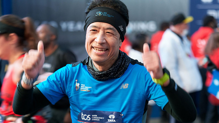 Dr. Kato celebrates finishing his eighth New York City Marathon.
