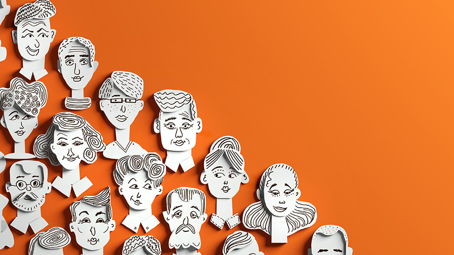 Photograph of black and white line drawn heads men and women on an orange background.